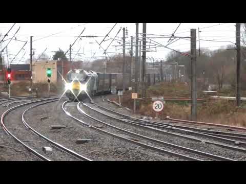 68016/68001 4z27 and 68003/68018 4s44 modals passing Lancaster,  23rd December 2022