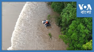 ড্রোন-চিত্রে দেখা যাচ্ছে, অস্ট্রেলিয়ায় বন্যাপীড়িতদের উদ্ধার করা হচ্ছে