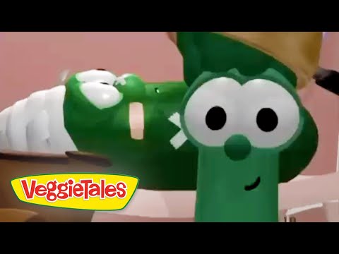 Friendly green VeggieTales character with big round eyes and a smile; VeggieTales logo in the bottom-left corner.