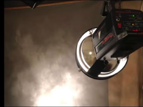 Dynamic Background Lighting for Studio Portraiture. Adding a grid spot is your answer!