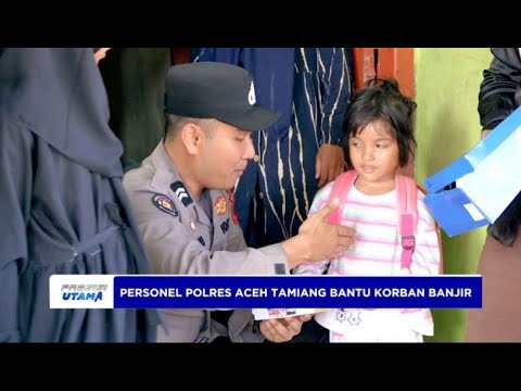 PERSONEL POLRES ACEH TAMIANG BANTU KORBAN BANJIR