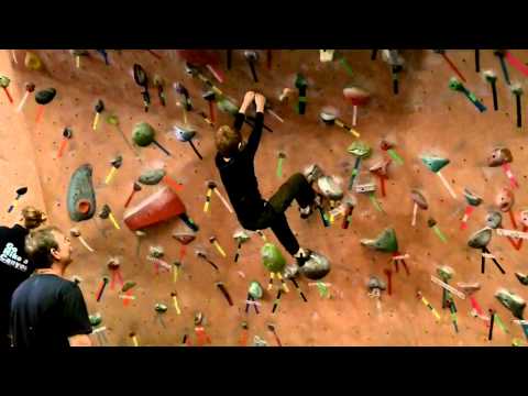 Son climbing at Earth Treks and almost kicks Dad 1-8-2011