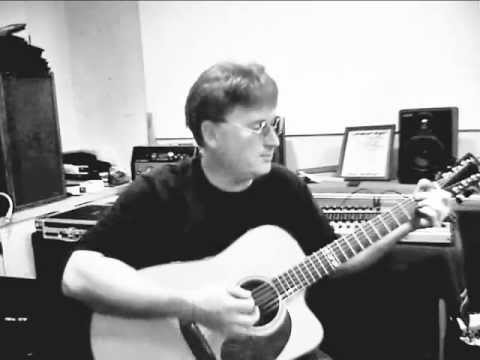 Mark Helmick  with a Randolph Guitar  (Buffalo Nickel)