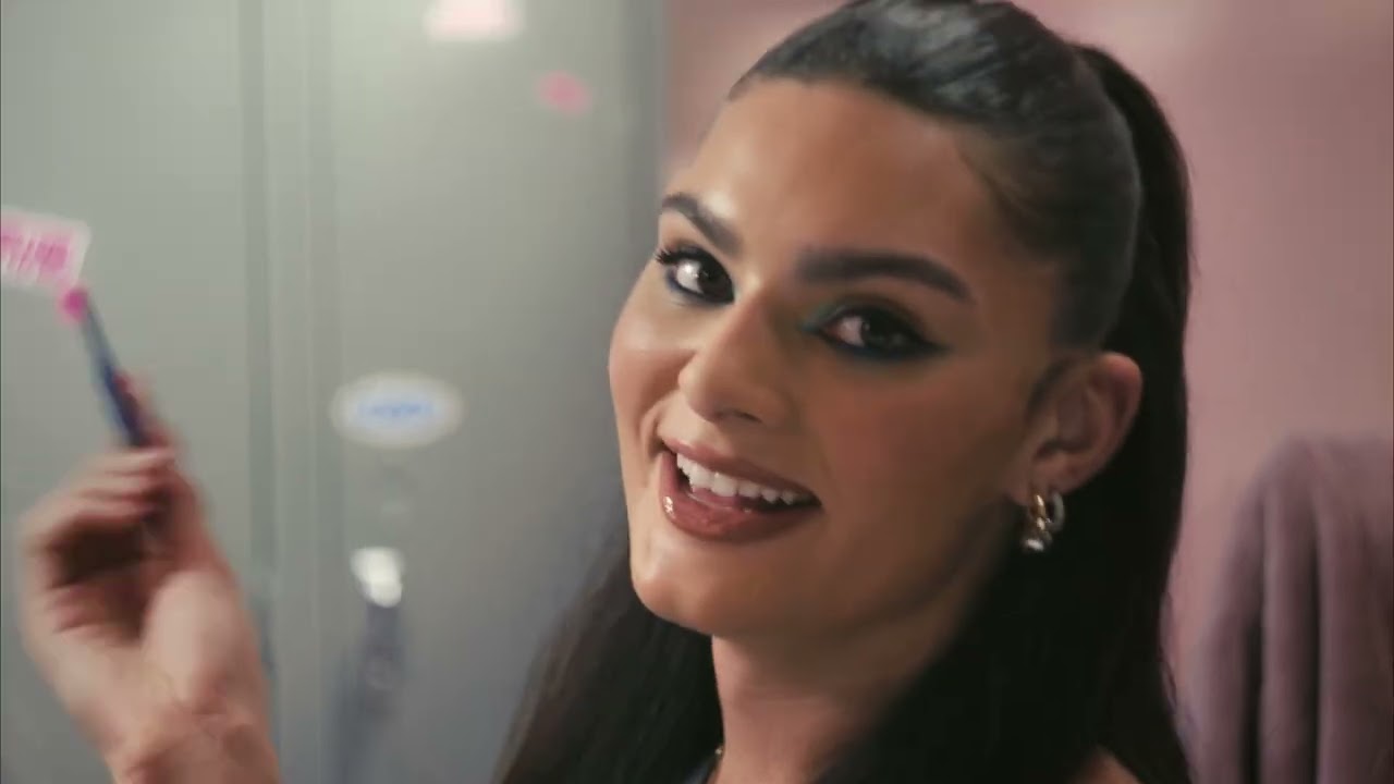 A 30-second, fast-paced spotlight on collegiate athlete Lauren Betts, showing her doing a variety of activities, including playing basketball, applying NYX Professional Makeup, and dancing behind a DJ booth. At the end, "NYX Professional Makeup Make Them Look" flashes across the screen.