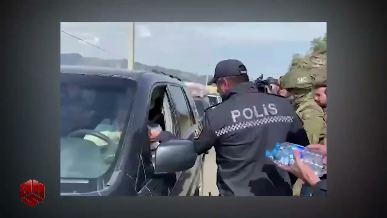 Azərbaycan polisi ermənilərə su paylayır VİDEO
