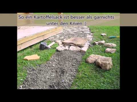 Gartenweg selbst gebaut: Natursteinweg aus Feldsteinen