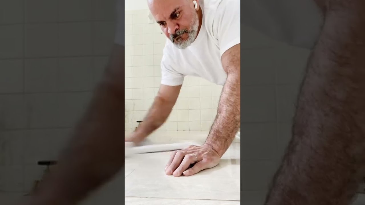 Handyman R Us NYC, Replacing old bathroom tile with large format porcelain tiles