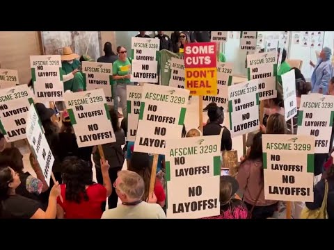 Workers rally after UC San Diego Health announces layoffs