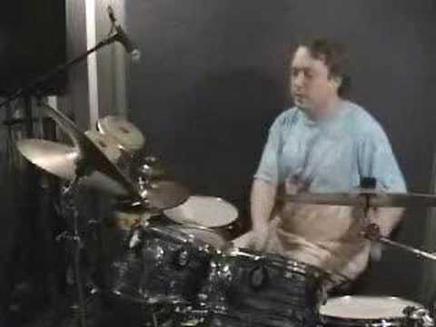 Bongo John drums in 12/4 time