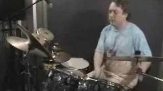 Bongo John drums in 12/4 time
