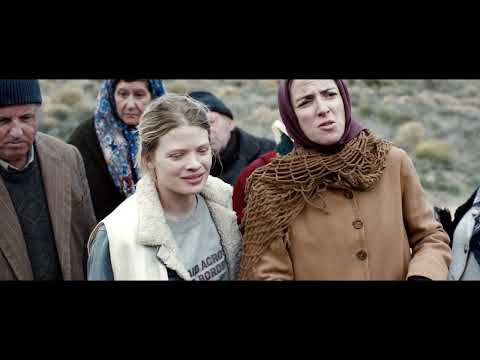 Trailer montage — rope over a pulley, a well mouth, quick cuts timed to percussive hits