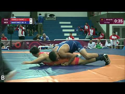 1/2 GR - 63 kg: D. MARTINEZ DE  (MEX) df. J. VARELA GARCI (GUA) by VSU, 8-0