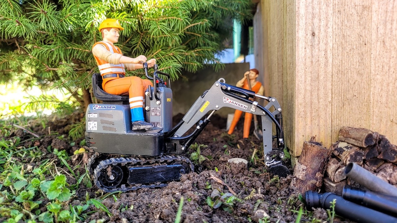 Gutter installation on the farm. RC Micro excavator Jansen MB500 1/15 Scale