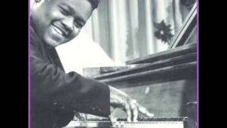 Fats Domino.  It keeps raining .