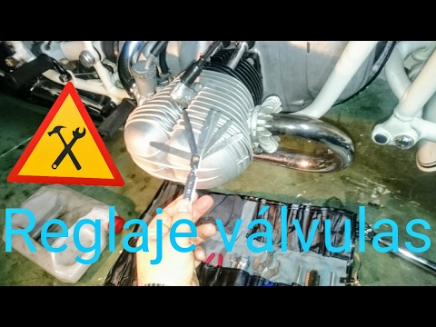 How to make an adjustment of valve clearance in a engine