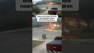 Motorcycle slides off road, explodes near children in residential area