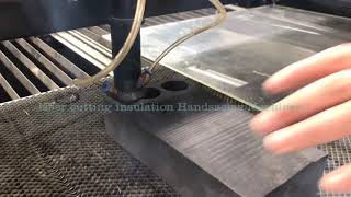 Lasercutting machine for cutting out insulation material