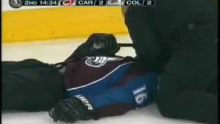 Darcy Tucker gets boarded by Tuomo Ruutu