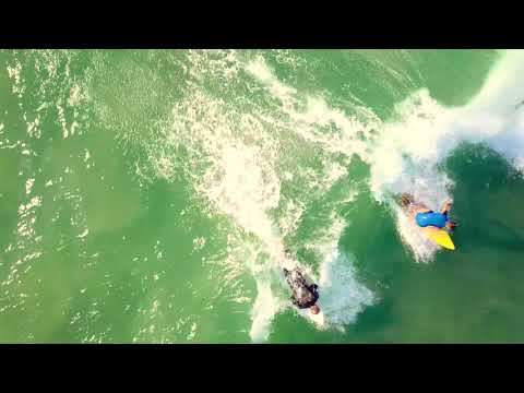 Drone footage of Plage Du Loch and fun waves