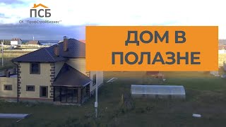 Дом из блока 9м х 10м с гаражом 4м х 7м, с облицовкой еврокирпичом /ПСБ