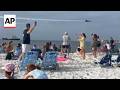 Video Shows A Fighter Jet Flying Low Over A Crowded Beach In Florida