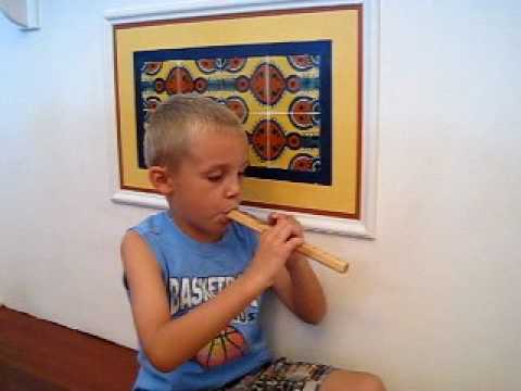 boy playing serbian flute