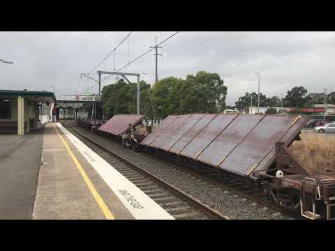 Pacific National NR64 & NR5 working 6NY3 south through Villawood, V-set passing & K-set arriving