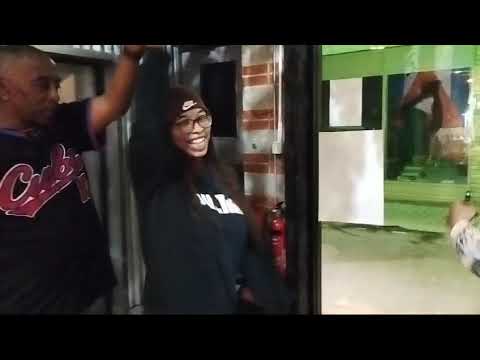 Father and daughter (just passing by) dance at 'A Taste of Salsa' Caribbean Roast