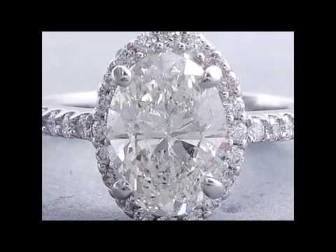 2.19 ctw Oval Cut Diamond Engagement Ring with a 1.77 Carat H Color/SI2 Clarity Center Diamond