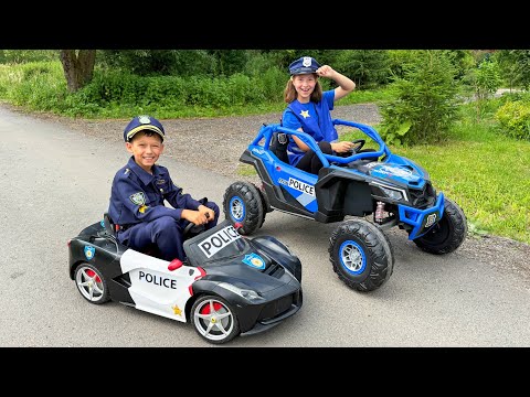Sofia and Max are playing cop and thief and riding in children's police cars!