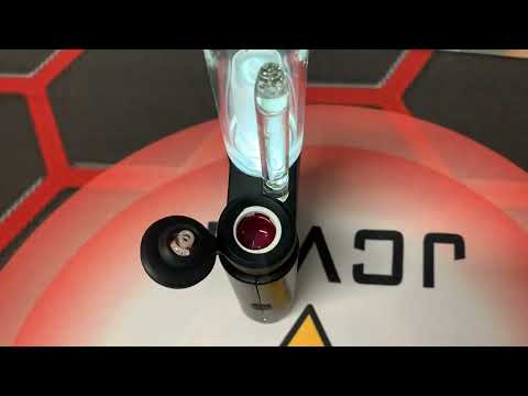 The JCVAP pockety smart dab rig vaping with ruby insert