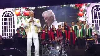Pat Boone singing "We Wish You A Merry Christmas"