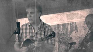 Just a Lie by Si Kahn, sung by Tom Rozum and Laurie Lewis