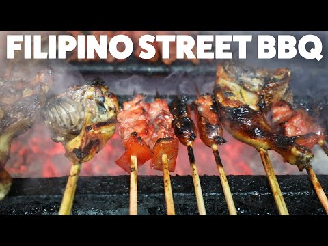 As pessoas experimentam o melhor churrasco filipino em Cebu, Filipinas
