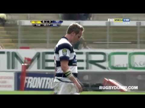 Jason Eaton pokes Brent Ward in the bum