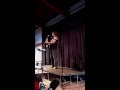 John Flynn performs "Crazy as Ever" at the One World Coffeehouse