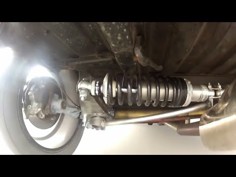 Horizontal spring double wishbone suspension