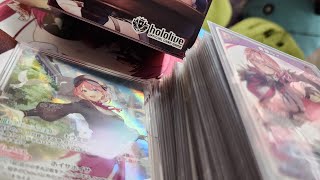ホロカのデッキををスリーブに入れていく。　鷹嶺ルイ　紫