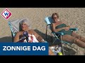 Zonliefhebbers genieten op het Scheveningse strand - OMROEP WEST