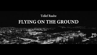 Kadr z teledysku Flying on the Ground tekst piosenki Tellef Raabe