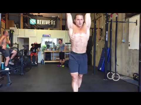 Dumbbell Overhead Carry