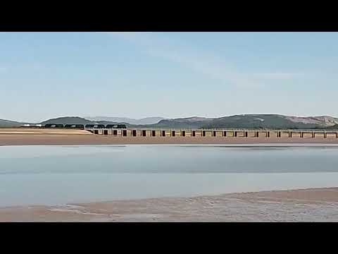 6k73 Sellafield to Crewe Coal Sidings 4 x class 68 with 2 flasks crossing Arnside viaduct 3/6/23
