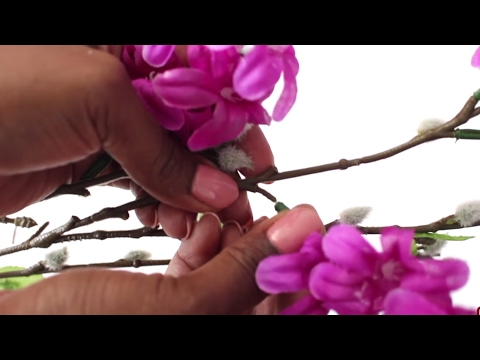 Part of a video titled How To Transform Dollar Tree Flowers Into A Decorative ...