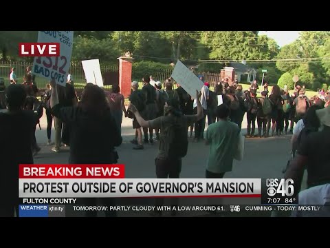 Tensions rise among protesters outside the Governor's Mansion