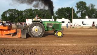 preview picture of video 'MTTP TRUCK/TRACTOR PULLS GREENVILLE, MI FIELD FARM TRACTOR CLASS  6-27-14'