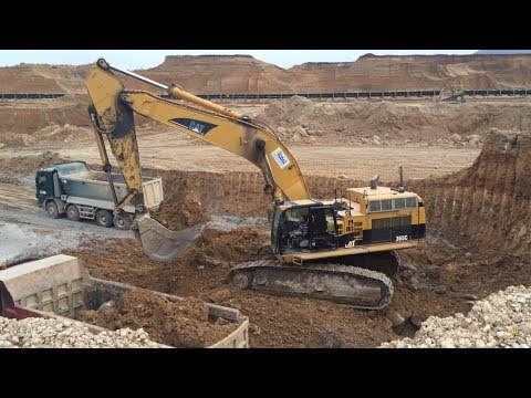 Caterpillar 365CL Excavator Loading Mercedes Actros 4141 And 4140 Trucks