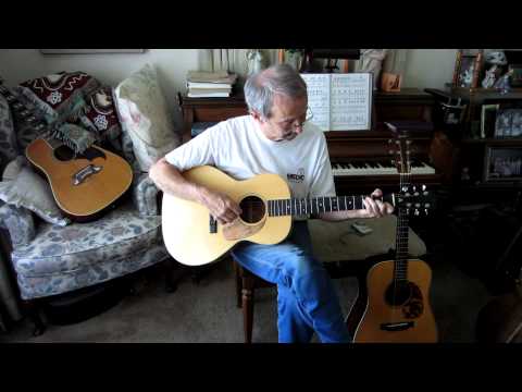 John Arnold Playing his Maple Guitar