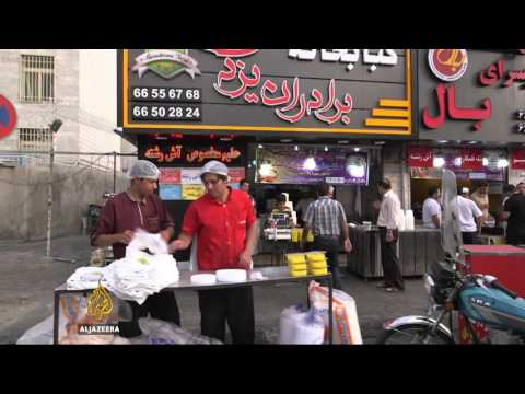 Iran rejoins world economy as sanctions are lifted