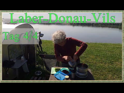 Alles gemütlich. Frühstück am See mit Fahrradwohnwagen, Storch mit Geschichte. Viel Wasser.