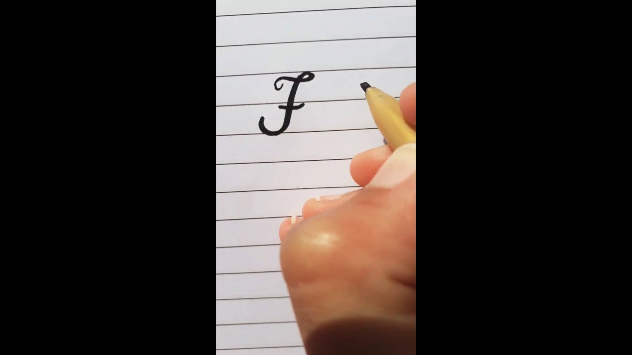 How to write E letter in Cursive Writing.
